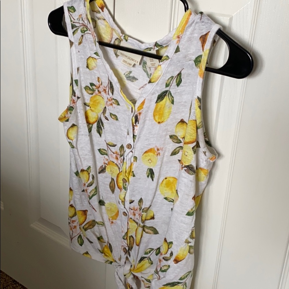 Linen sleeveless button down with tie bottom